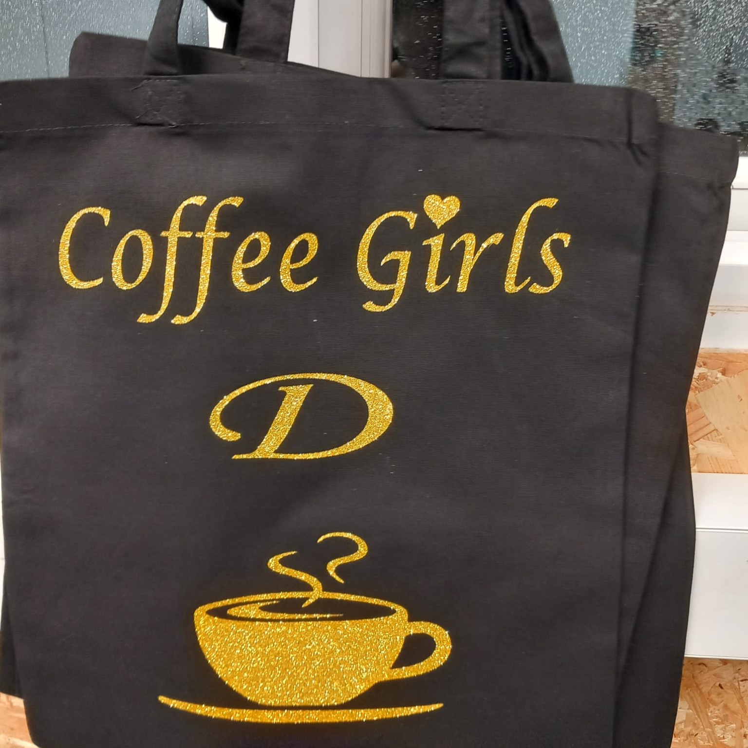 Black Coffee Girls tote bag personalised with a gold initial D and coffee cup design